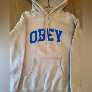 Obey Beige Hoodie with Blue Lettering